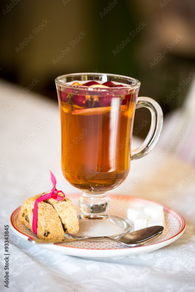 glass Cup of fruit tea with biscuits glass Cup of fruit tea with biscuits