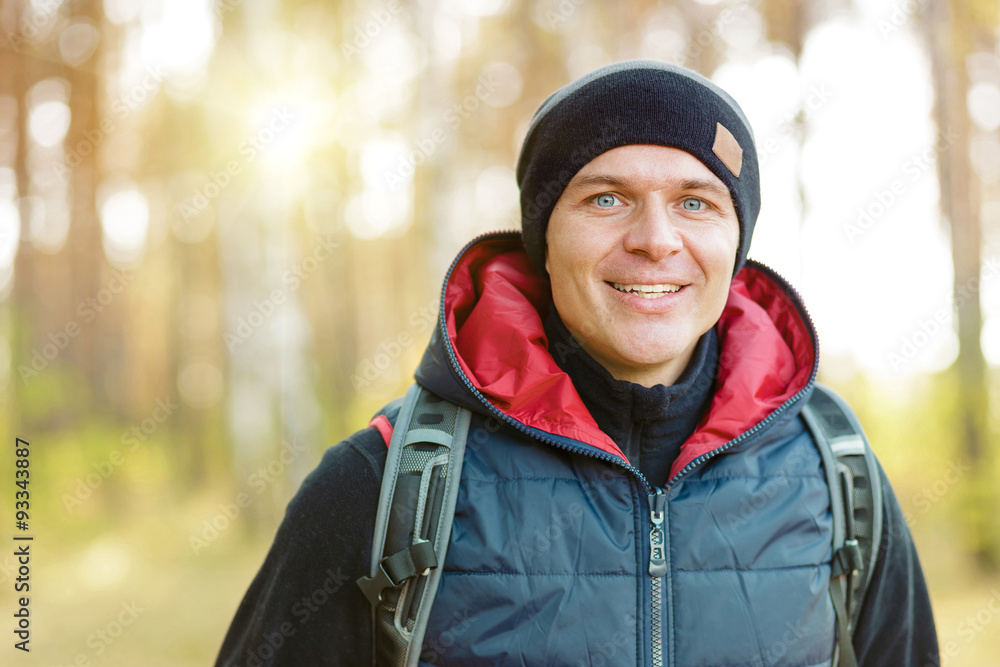 man hiking in a forest man hiking in a forest