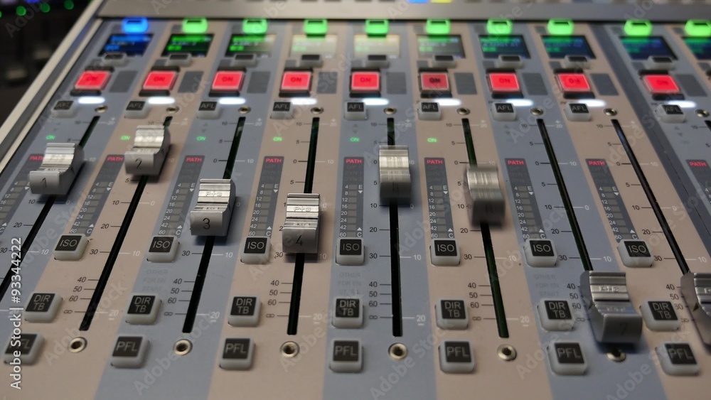 Front shot of an audio mixer and its knobs being pulled up and down automatically... Front shot of an audio mixer and its knobs being pulled up and down automatically...
