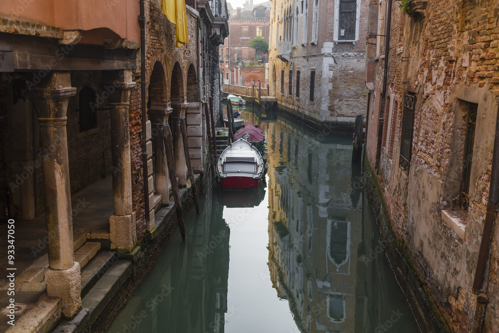 Venice canal with motorboat engines