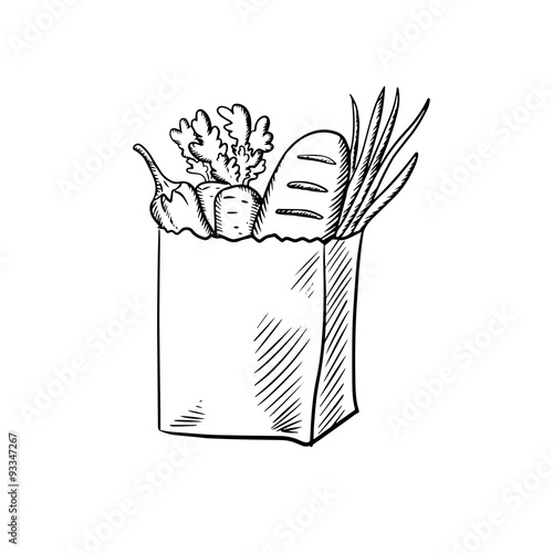 Fresh vegetables and bread in paper bag