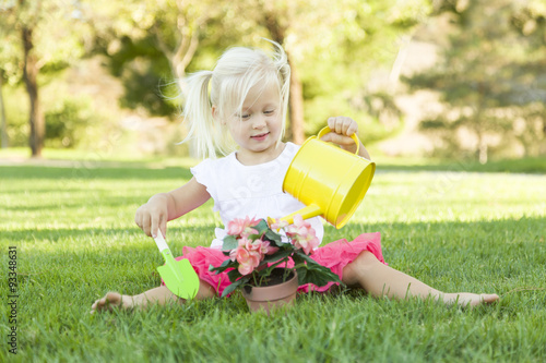 Little Girl Playing Gardene...
