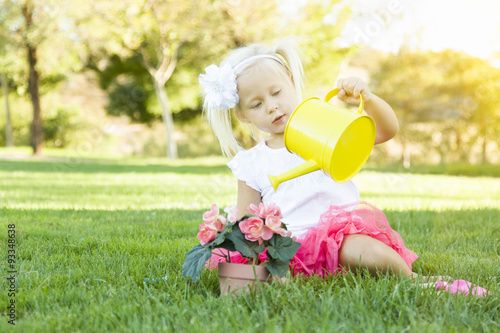 Little Girl Playing Gardene...