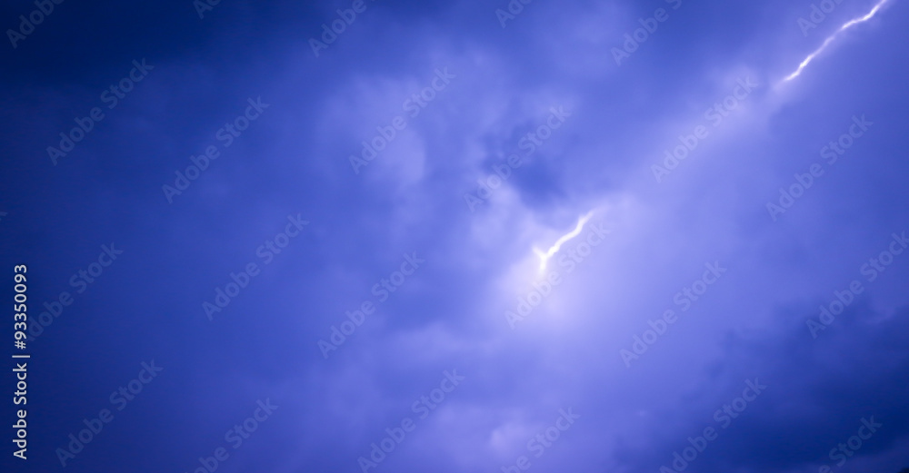 Lightning strike on the dark cloudy sky. In the rainy season in Asia.