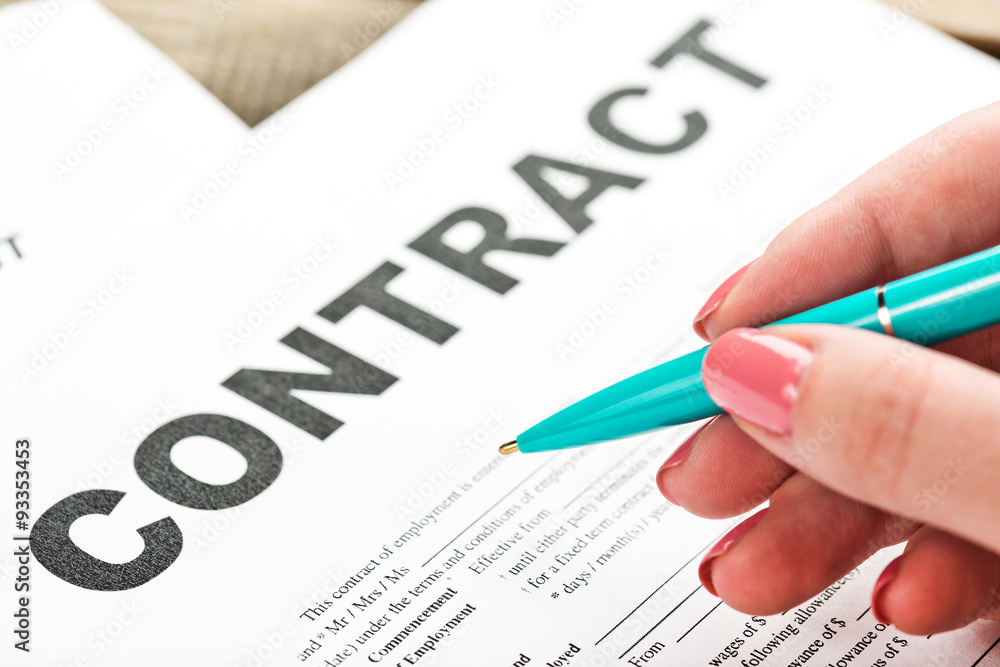 Pen on the contract papers Pen on the contract papers