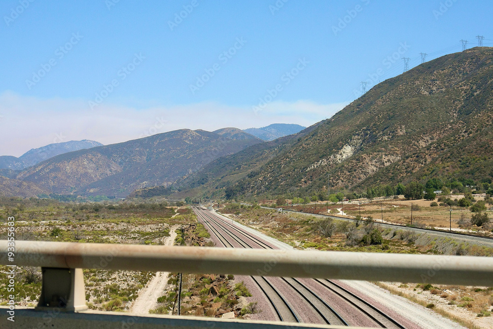 View of mountains and a road from the bridge