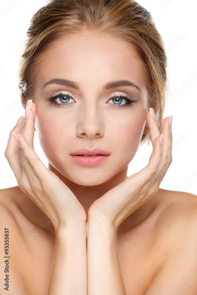 Young woman touching her face isolated on white background Young woman touching her face isolated on white background