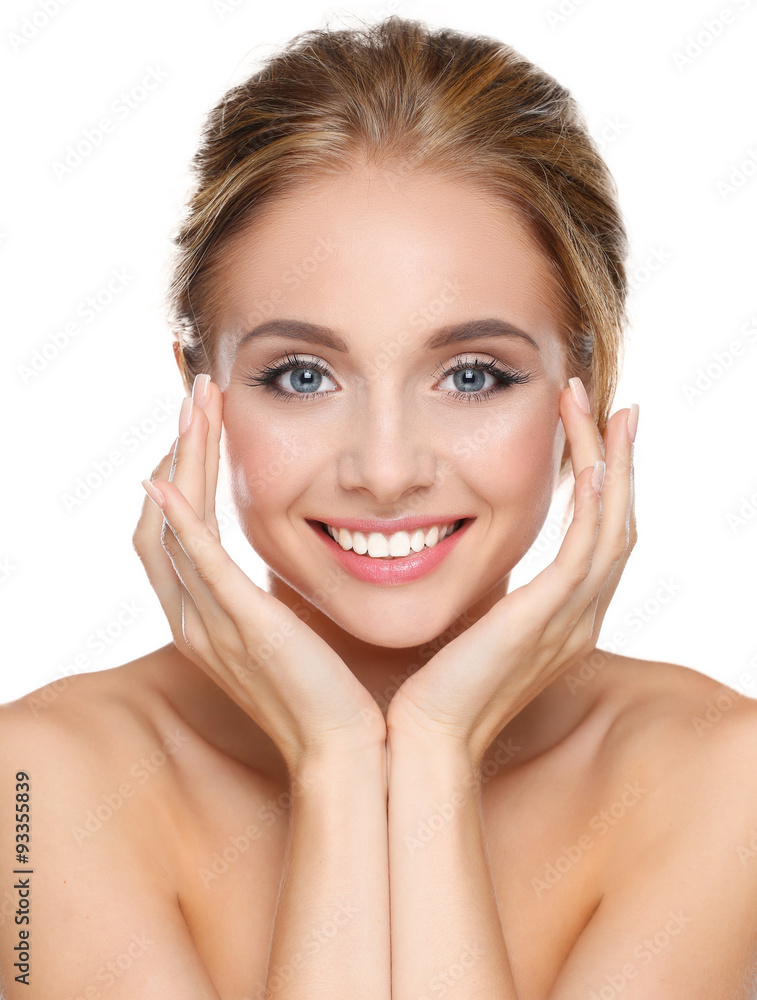 Young woman touching her face isolated on white background Young woman touching her face isolated on white background