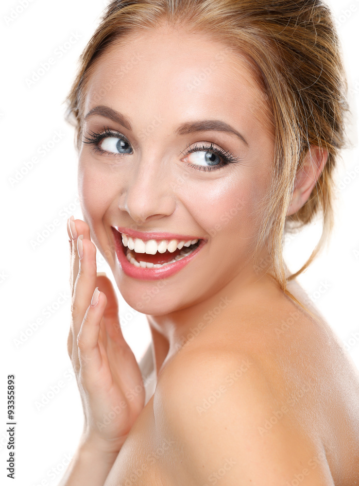 Young woman touching her face isolated on white background Young woman touching her face isolated on white background