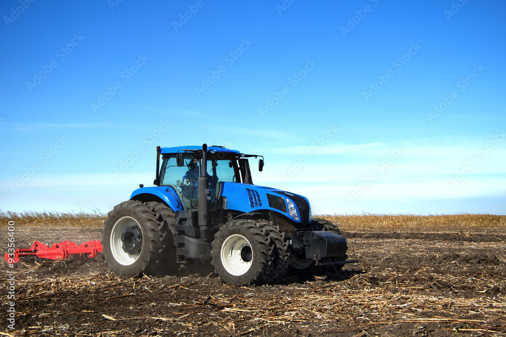 Tractor plowing field Tractor plowing field