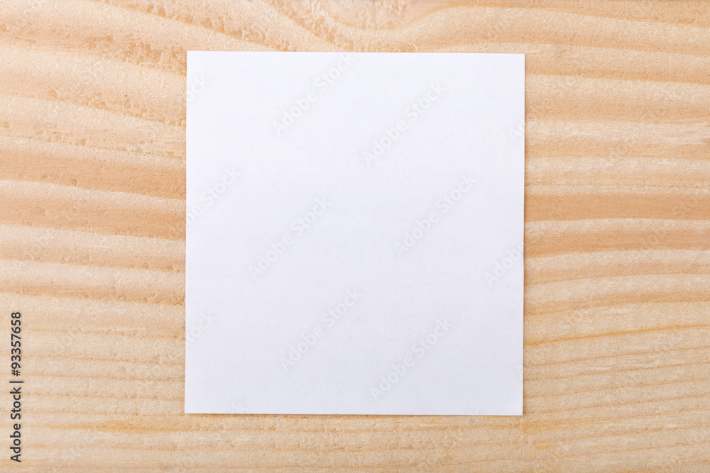 Blank paper on wood background Blank paper on wood background