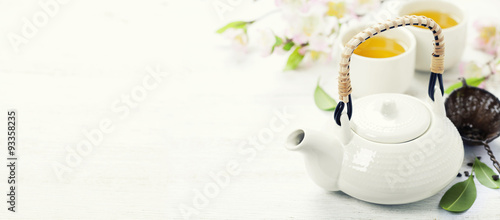 Chinese Tea Set and pink sakura blossom