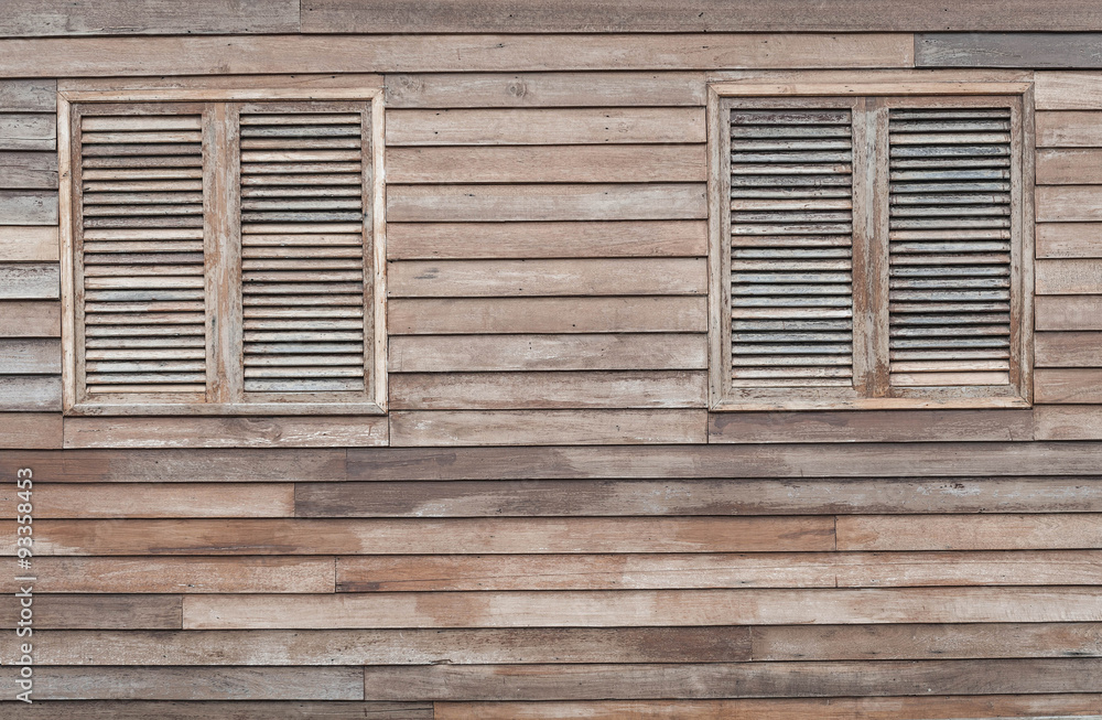 Windows on wooden wall background Windows on wooden wall background