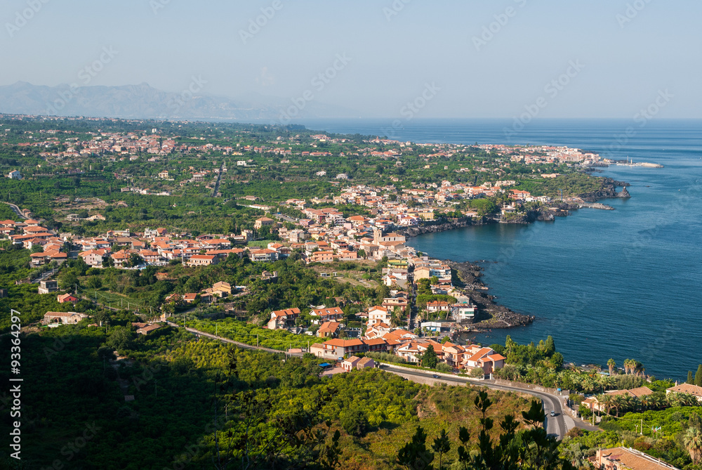 Aerial view of towns along the eastern coast of Sicily, near Catania