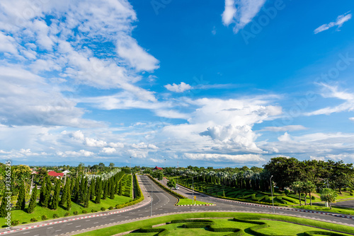Roadside view of beautiful park on blue sky © bouybin