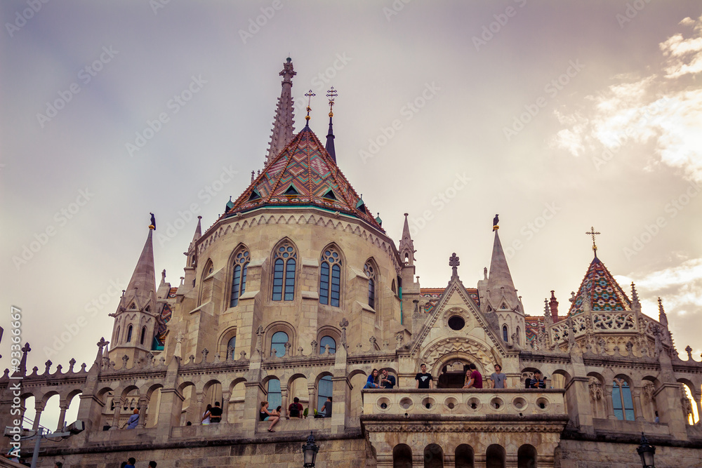 Naklejka premium Budapest, Hungary - September 19, 2015: People visit the Fisherman's Bastion in Budapest, Hungary at sunset time 