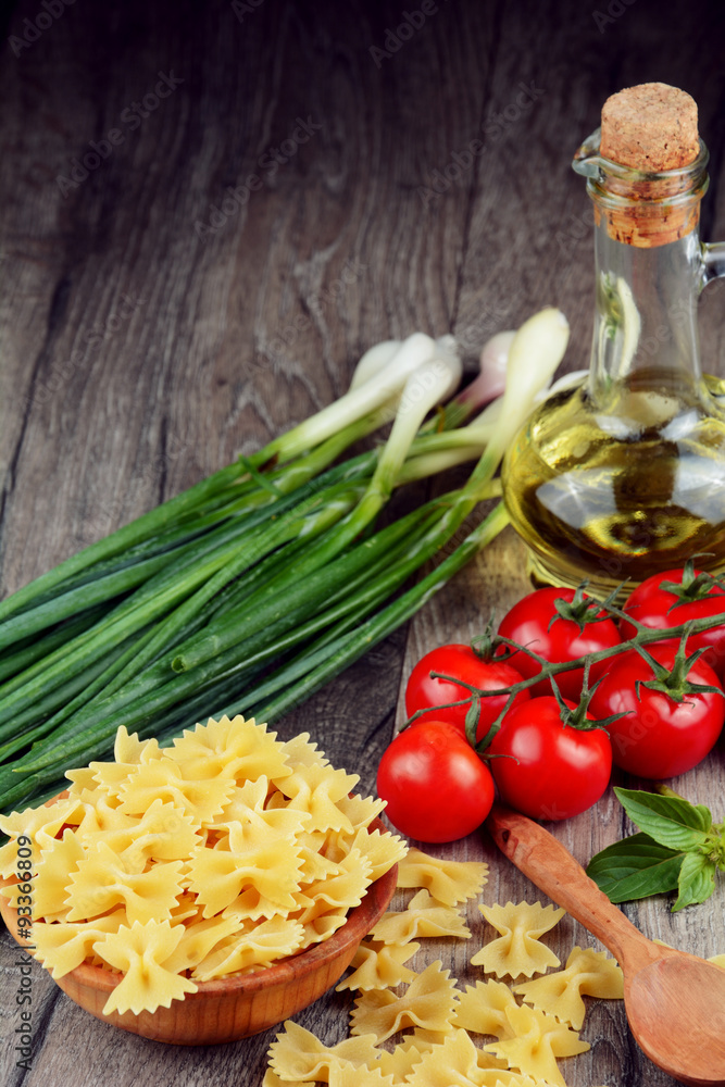 Raw farfalle pasta in bowl Raw farfalle pasta in bowl