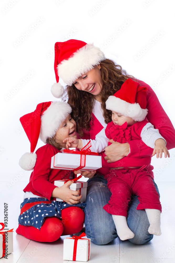 Happy family celebrating Christmas Happy family celebrating Christmas