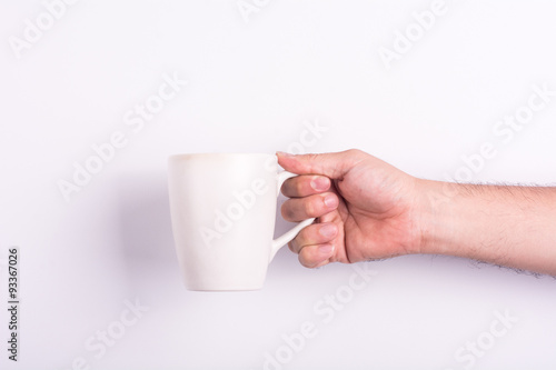 cup of coffee in hand 