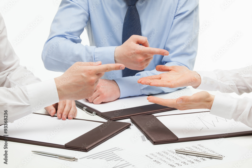 Business people accusing their business partner Business people accusing their business partner