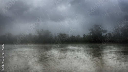 Heavy rain over a river