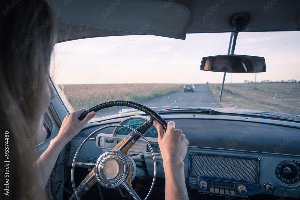 Naklejka premium girl in retro car