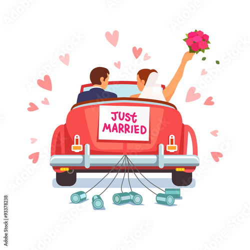 Newlywed couple is driving car for their honeymoon