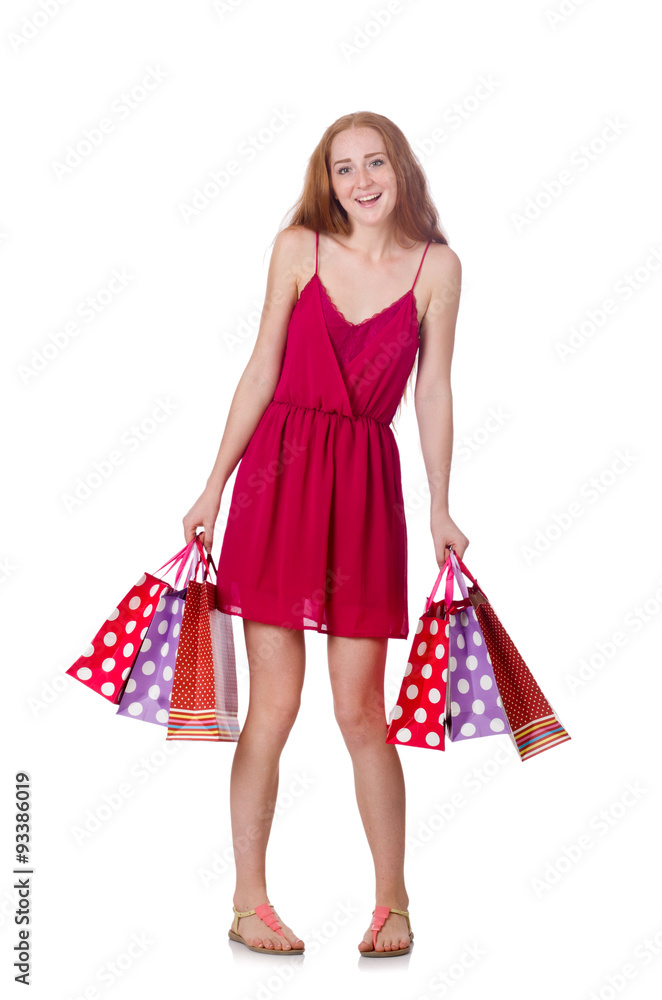 Woman with shopping bags isolated on white Woman with shopping bags isolated on white