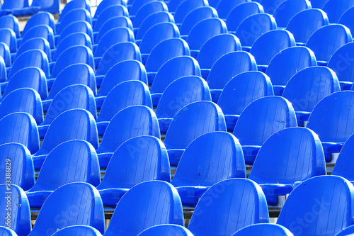 blue plastic seat in the street scene
