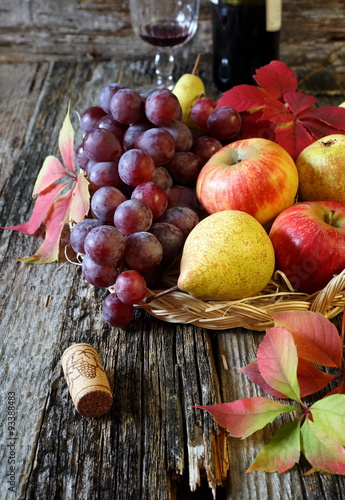 Autumn fruit-piece with fruits and red wine