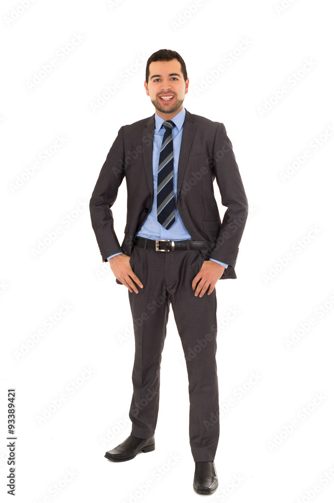 hispanic man standing in a suit hispanic man standing in a suit