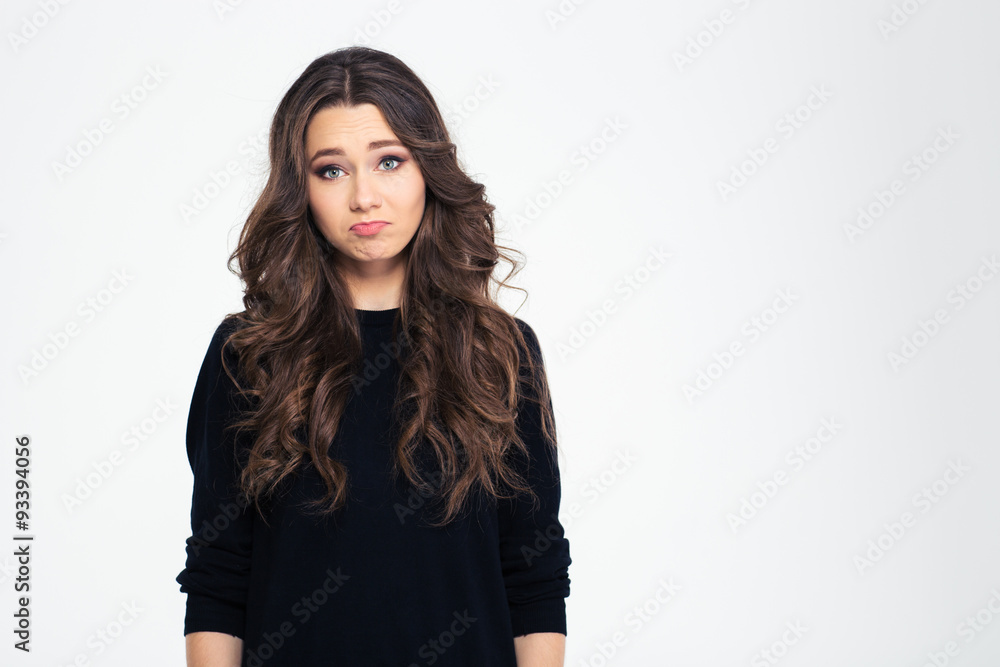 Portrait of a sad girl looking at camera Portrait of a sad girl looking at camera
