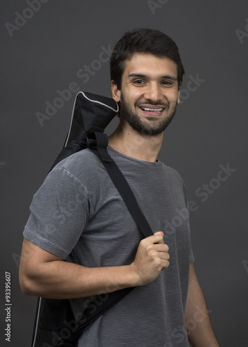 Portrait of a casual man on gray backgraud photo