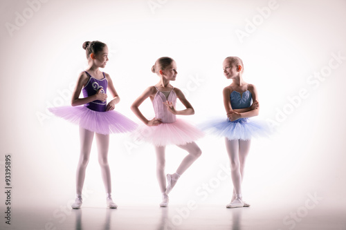 Fototapeta Naklejka Na Ścianę i Meble -  Three little ballerinas in dance studio