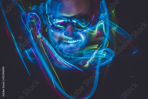 effect lightpainting man with sunglasses and colored lights