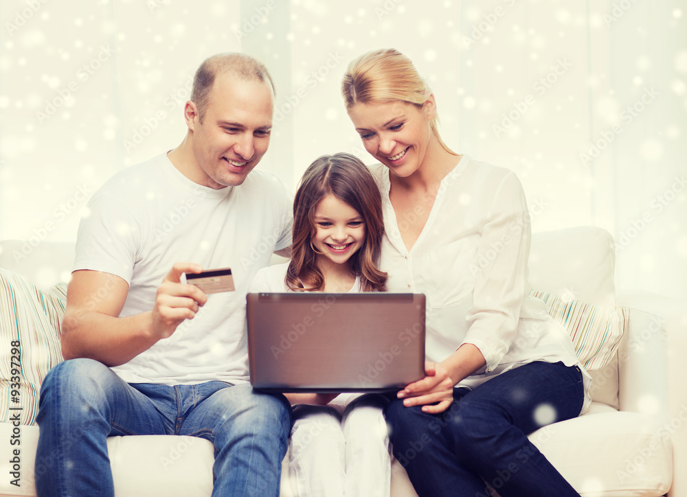 happy family with laptop computer and credit card happy family with laptop computer and credit card