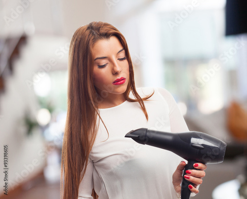 woman using a dryer