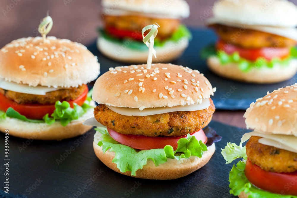 Appetizing mini chicken burgers. Appetizing mini chicken burgers.