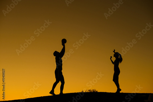 Silhouette figure of volleyball players. 