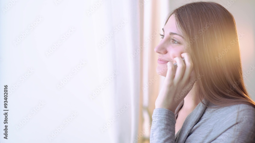 girl talking on the phone and smiling girl talking on the phone and smiling