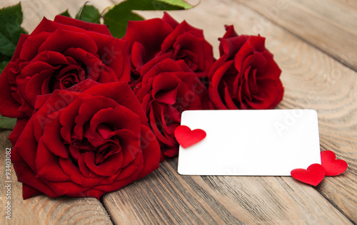 Fototapeta Naklejka Na Ścianę i Meble -  Red roses and greeting card