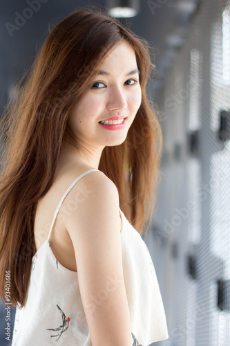 Portrait of thai adult beautiful girl relax and smile.