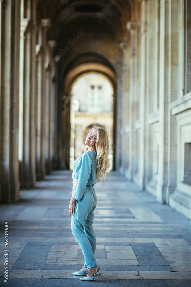Beautiful young woman in Paris, near the louvre