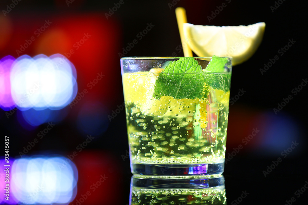Glass of cocktail on bar background Glass of cocktail on bar background