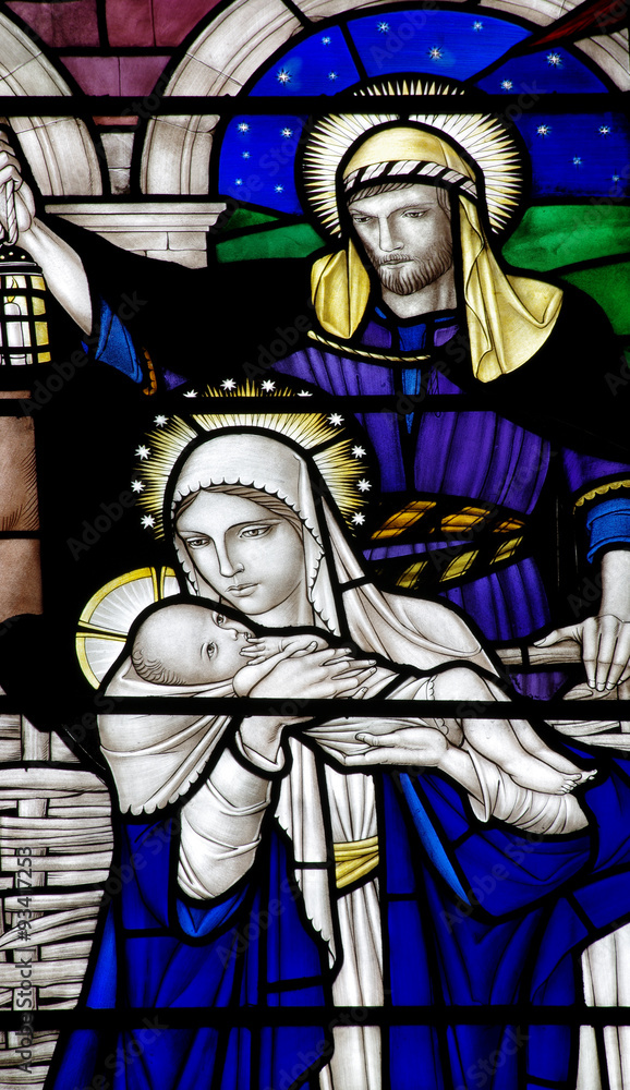 Mary with baby Jesus and Joseph in stained glass Mary with baby Jesus and Joseph in stained glass