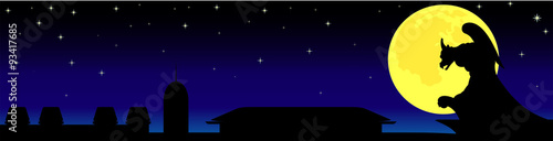 gargoyle statue on background of the full moon