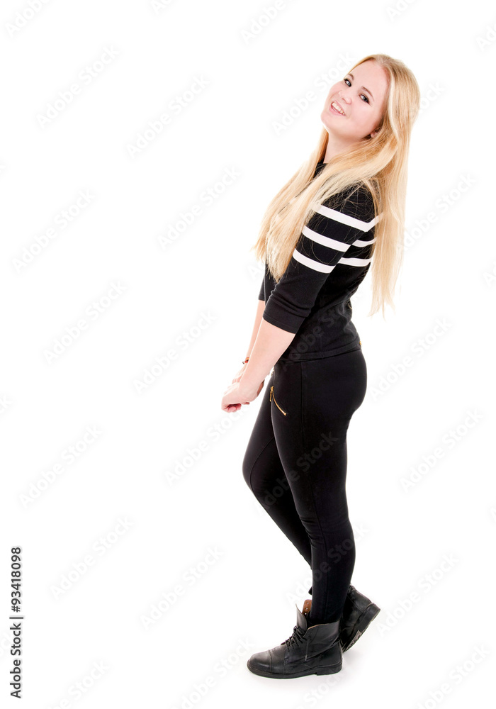 Weiblicher Teenager stehend, seitlich Weiblicher Teenager stehend, seitlich