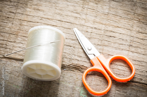 plastic transparent needle and scissors photo