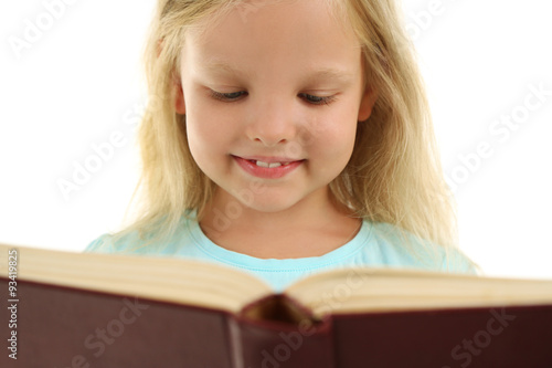 Beautiful little girl with book  isolated on white