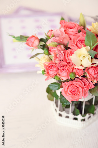 Beautiful rose in vase in room